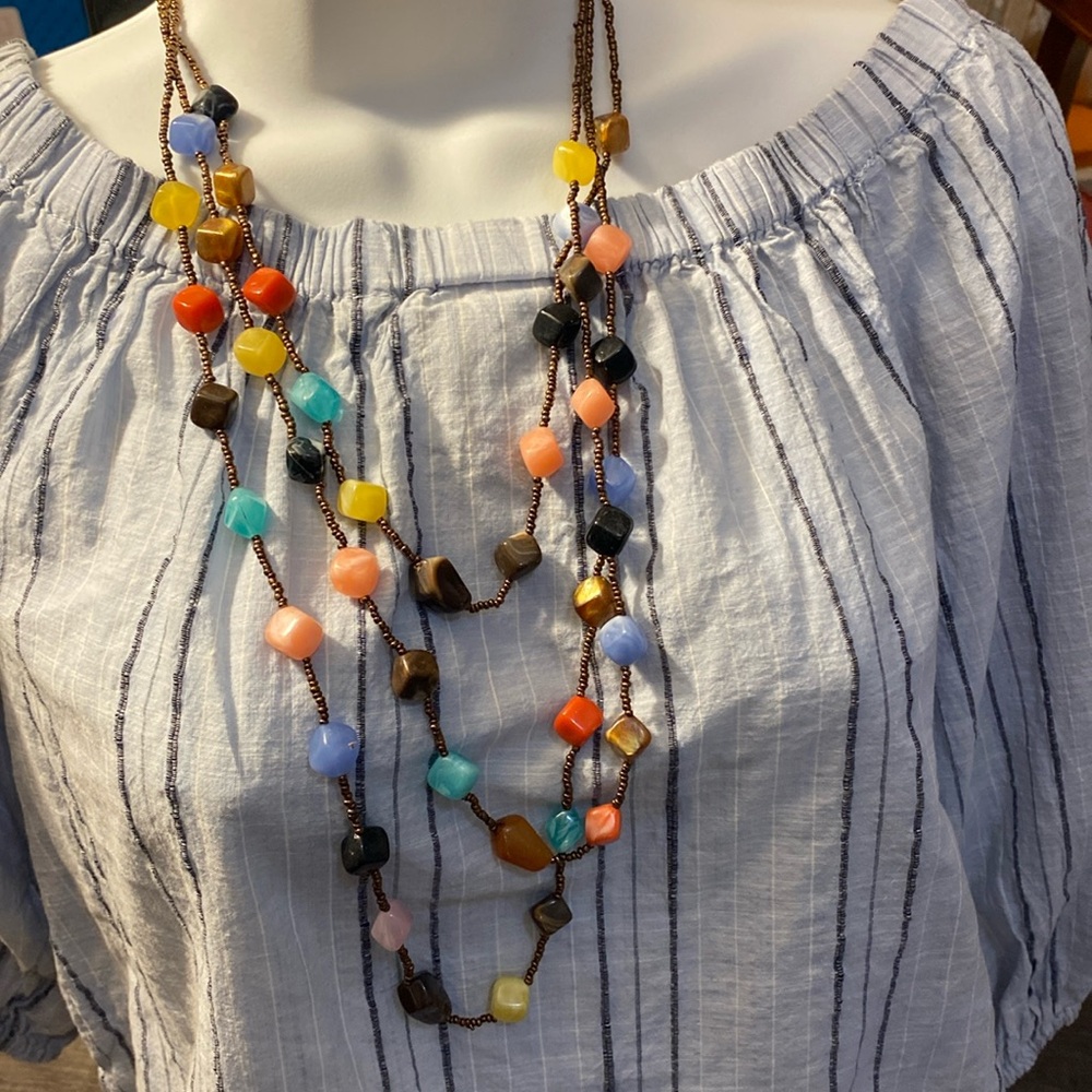 Costume jewellery multi strand beaded necklace